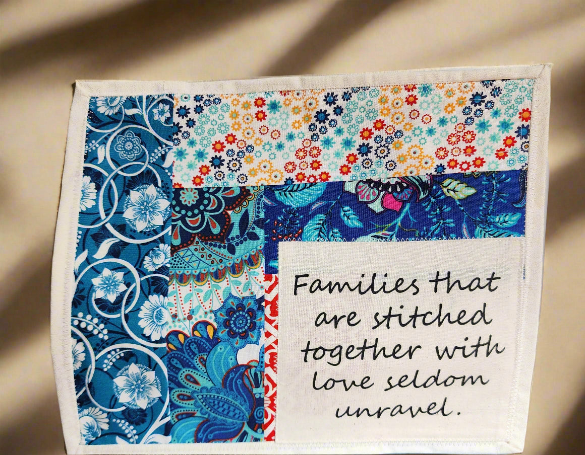 Snack mat: Families that are stitched together with love seldom unravel quilted in patterned primary colored fabric