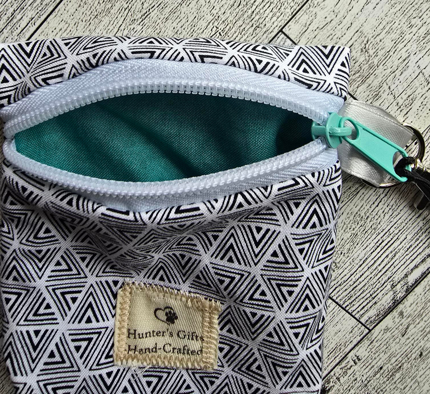 Small Coin Purse/ Ear Bud Case: Money/Card Holder Black and White geometric design with sea green lining: lobster claw to hock to your keys