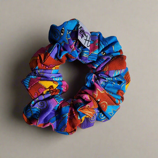 Scrunchies: multi-colored hair tie with horses on it