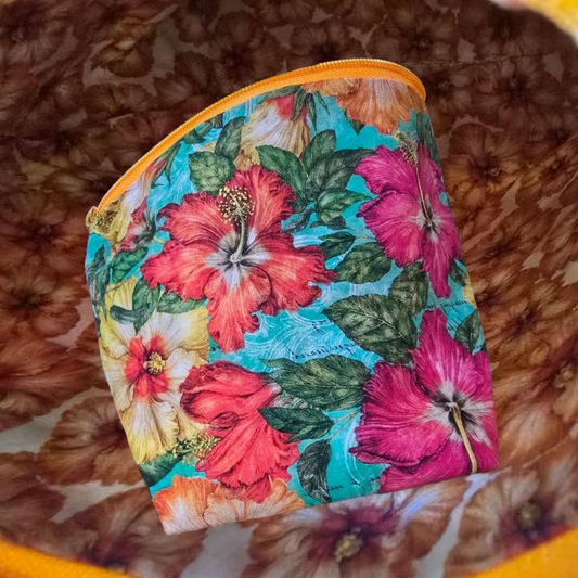 🌺✨ Exciting News! ✨🌺

Get ready to add a touch of paradise to your everyday essentials with our upcoming Hawaiian-themed handmade pouch! This vibrant beauty is perfect for carrying your must-haves in style. 🌟

🌸 Features:
- 🌺 Gorgeous floral fabric in stunning colors
- 🏖️ Perfect for vacations, beach days, and everyday use
- 🎨 Multiple versatile uses - cosmetic bag, travel pouch, or even an eco-friendly gift wrap!

Imagine all the ways you'll use this unique accessory, and stay tuned for the official