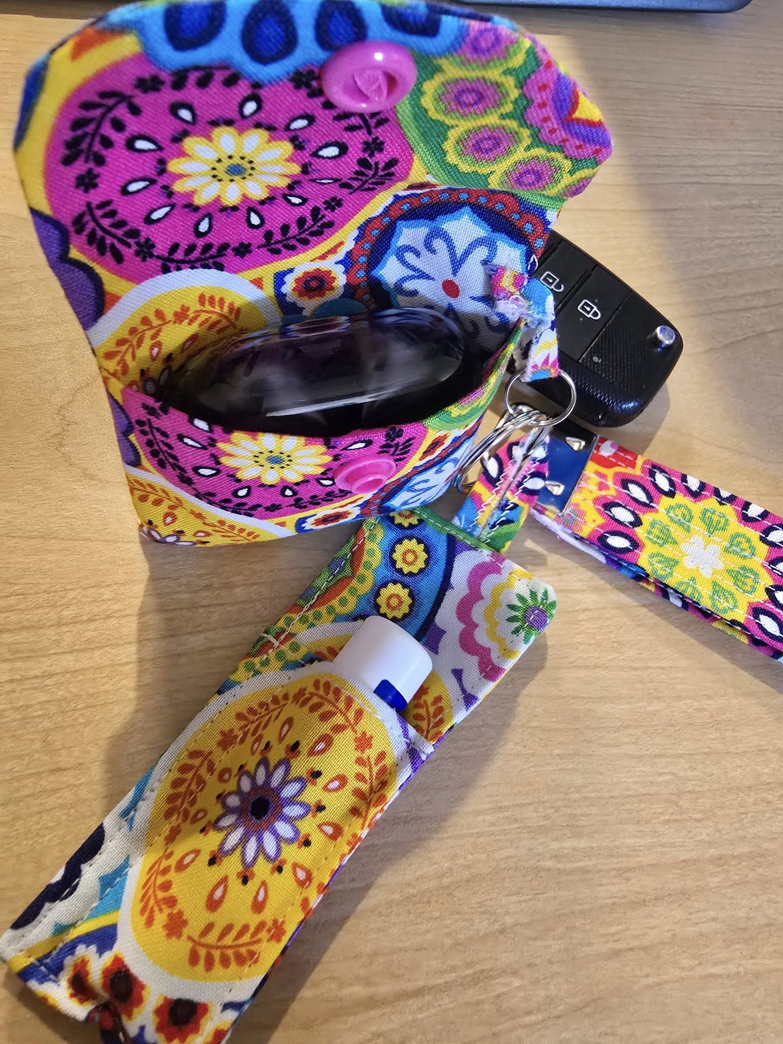 fun retro keychain with ear bud case, lip balm holder and a wristlet all matching: get them as a group or individually. 