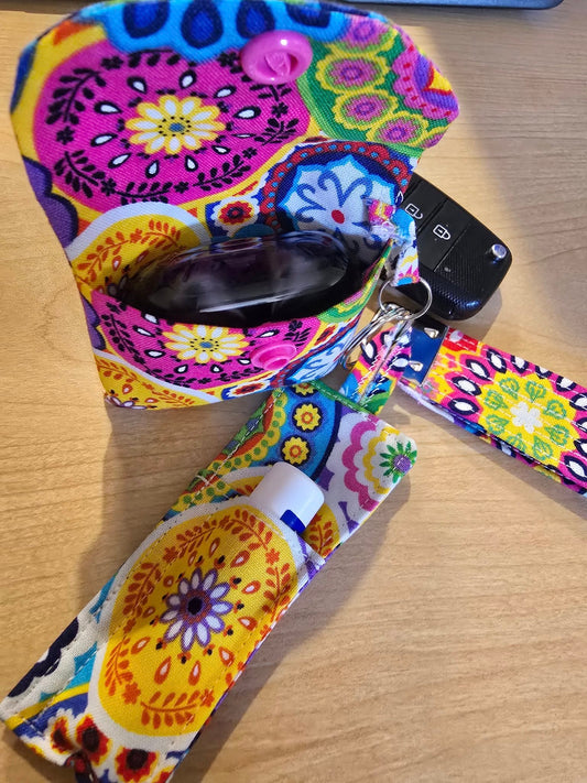 fun retro keychain with ear bud case, lip balm holder and a wristlet all matching: get them as a group or individually. 