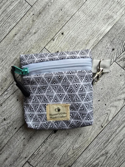 Small Coin Purse/ Ear Bud Case: Money/Card Holder Black and White geometric design with sea green lining: lobster claw to hock to your keys