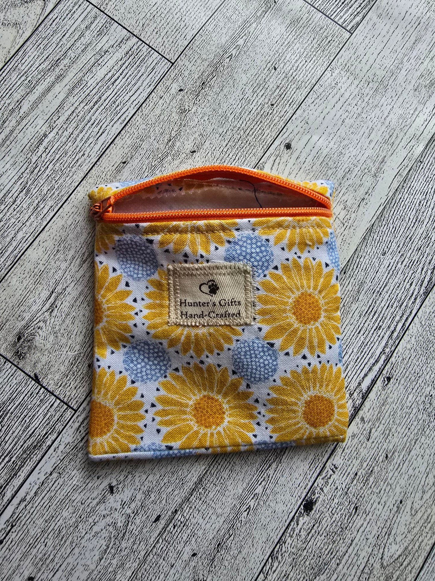 Small Coin Purse Ear Pod Case: yellow-orange  and blue flowers orange front zip: great for credit cards, keys holder, ear buds, coins, folded money, lip balm and more- add  a hook and with your keys.