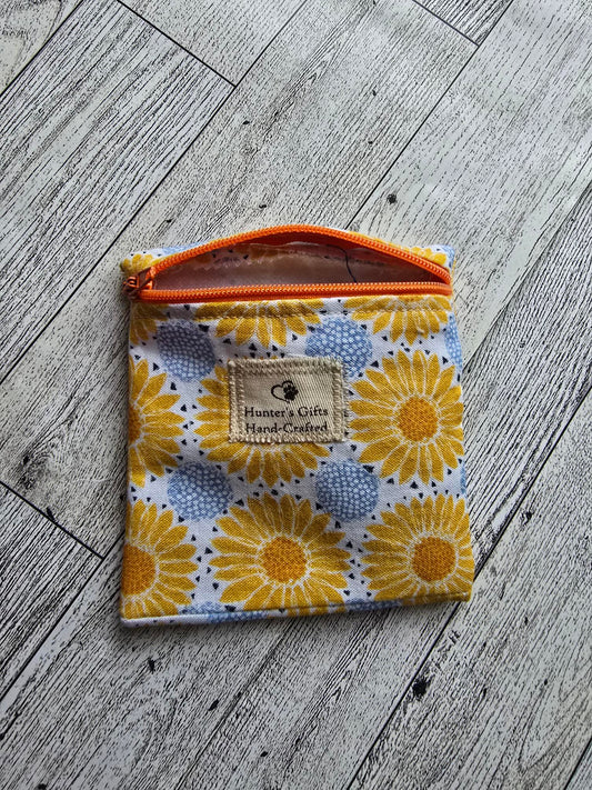 Small Coin Purse Ear Pod Case: yellow-orange  and blue flowers orange front zip: great for credit cards, keys holder, ear buds, coins, folded money, lip balm and more- add  a hook and with your keys.