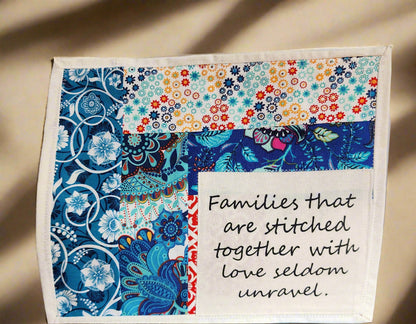 Snack mat: Families that are stitched together with love seldom unravel quilted in patterned primary colored fabric
