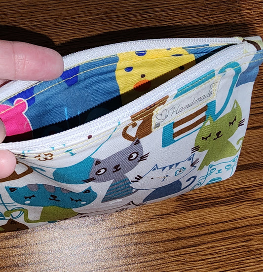 White Base: Colorful cats with White top zipper and grey liner : make-up case, key chain , money, coins,