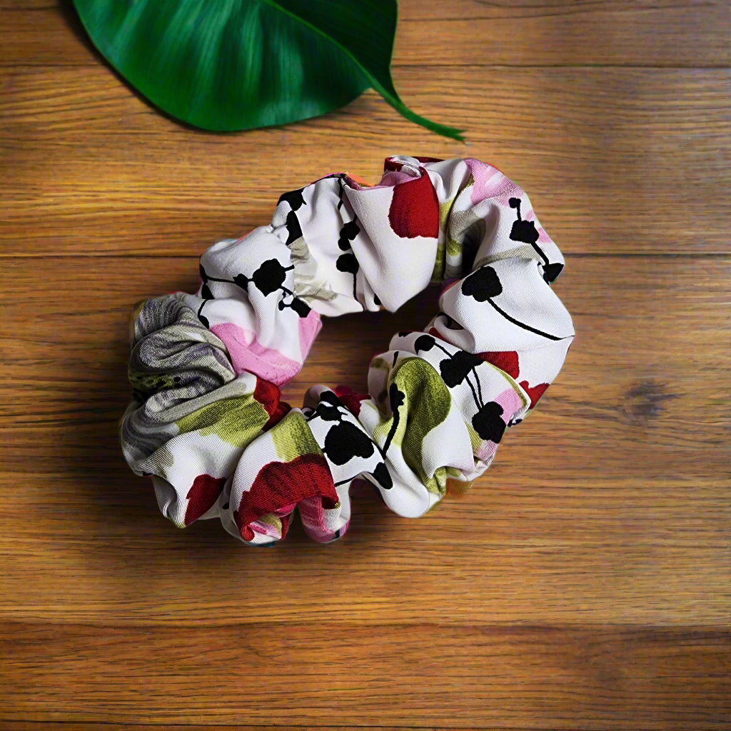 White background with red/pink floral pattern