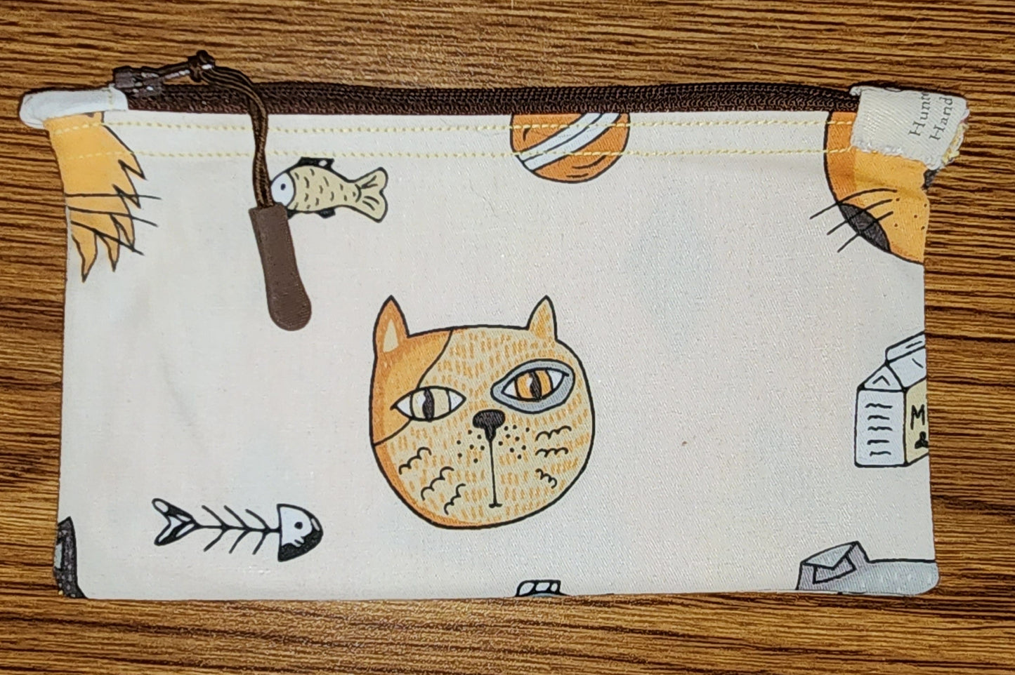 light brown with cute cats: Medium sized top zippered pouch: great to grab and go on the fly: card holder, keys, ear buds, so much more
